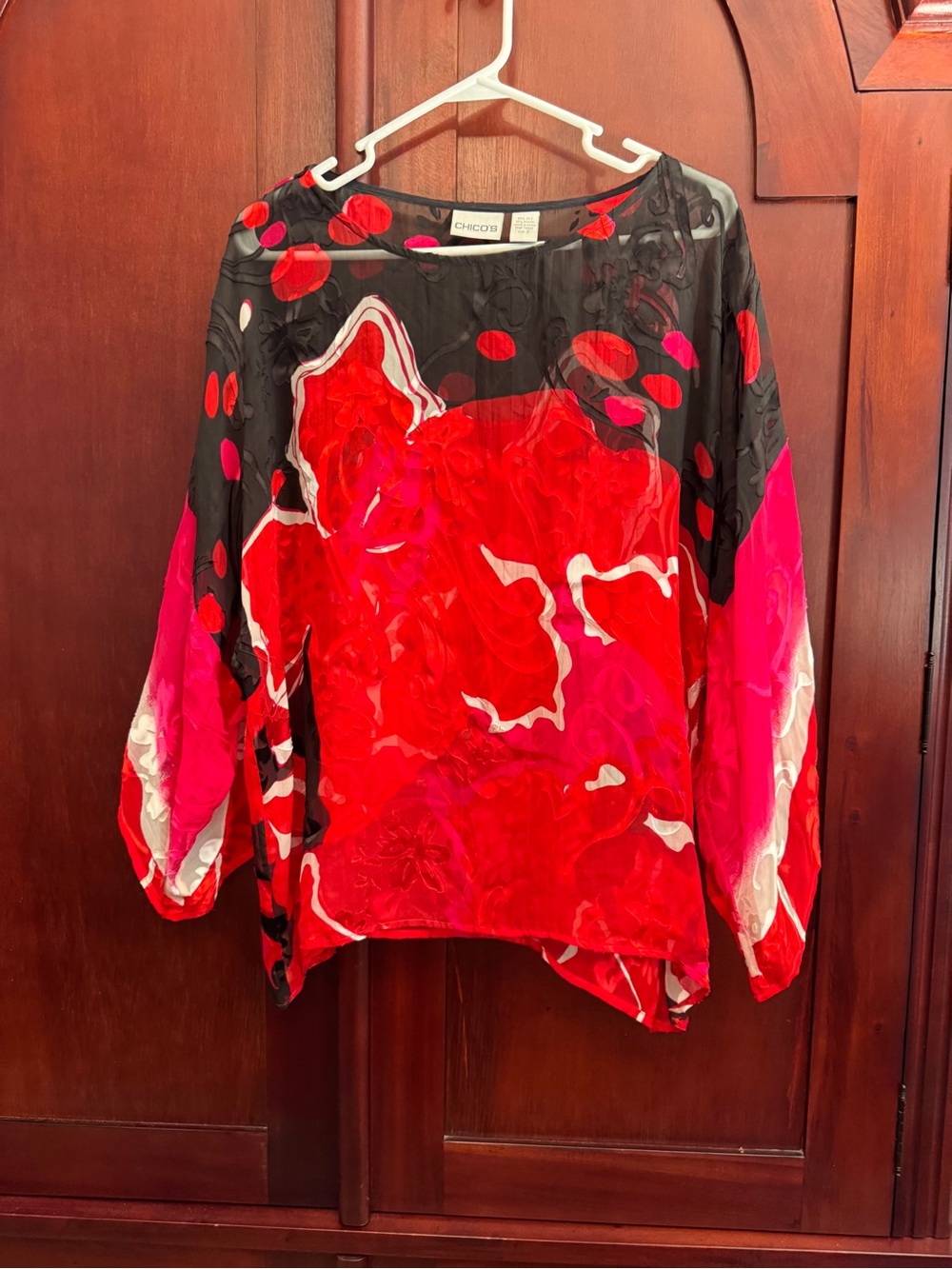 Chico's sheer black blouse vibrant red and pink abstract floral print. Size 2/L